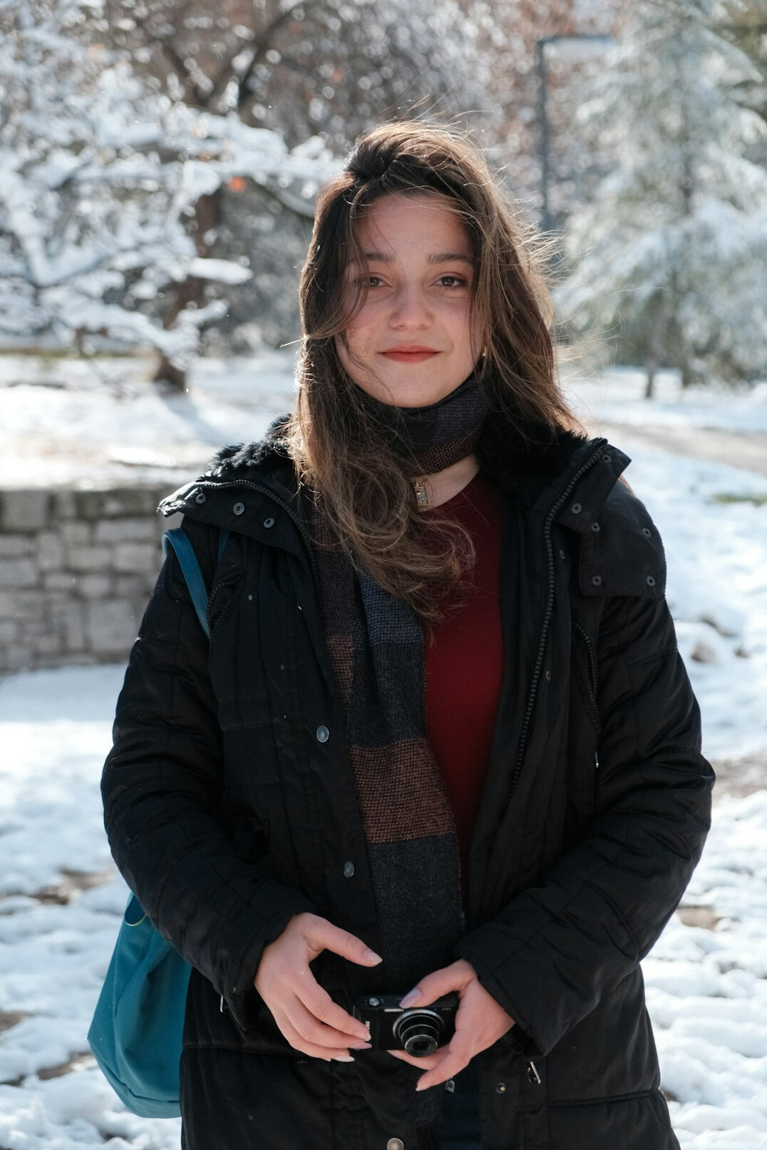Portrait of a smiling young woman with brown hair