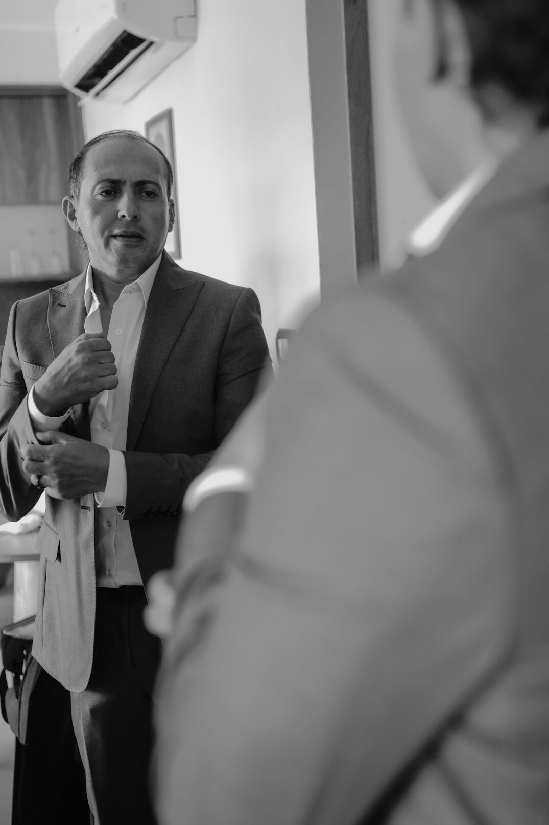 man practicing speech in mirror