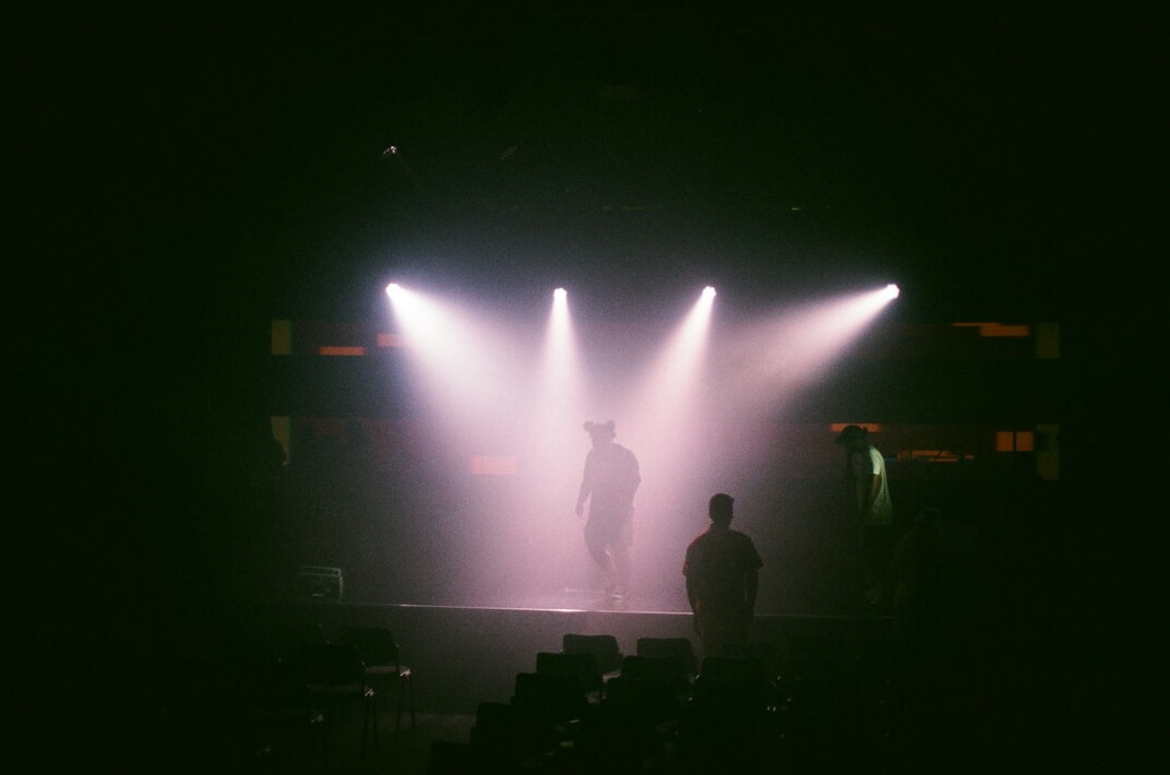 person overcoming fear on stage