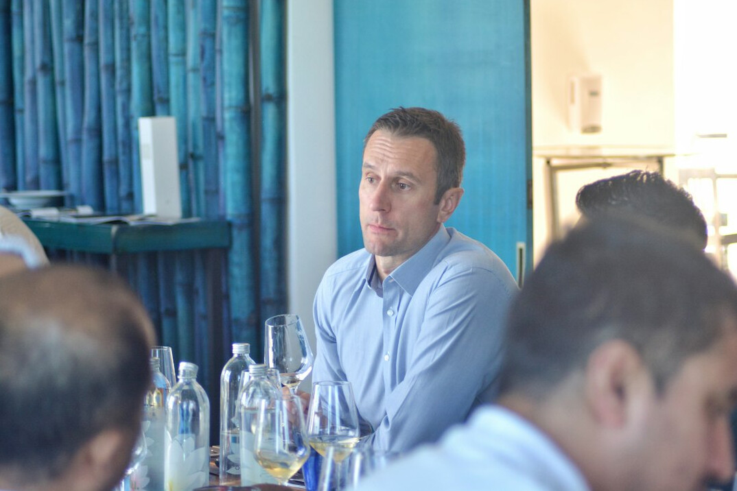 confident man speaking to group