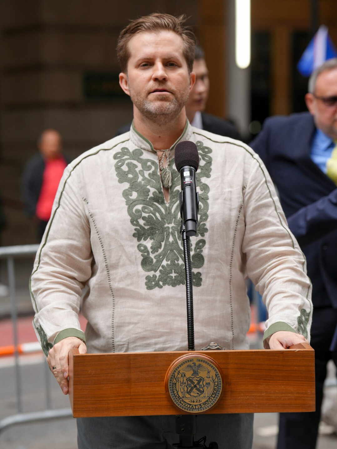 shy person at podium transforming